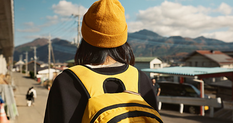 Image showing Asian, woman at train station and travel, back view on commute or holiday and freedom outdoor. Railway, walking on platform and transportation, journey for adventure in China and weekend trip