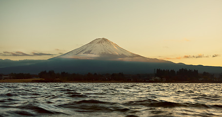 Image showing Water, mountain and waves at night with blue sky, clouds and outdoor natural scenery in Japan. Ripples, tide and eco friendly environment of nature, lake or view of greenery in countryside on mockup