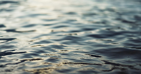 Image showing Water, ripple and nature with environment and lake, river or ocean with waves, calm and closeup. Earth, sea and natural background, moving liquid is tranquil and abstract with texture and light