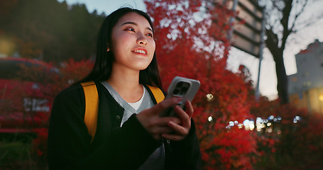 Image showing Happy asian woman, phone and night for communication, social media or outdoor networking in city. Female person relax on mobile smartphone in late evening for online chatting in urban town of Japan