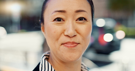 Image showing Mature woman, Asian in city and face with travel or commute to work and professional in Tokyo. Corporate lawyer in urban street, journey to office and happiness in portrait with business mindset