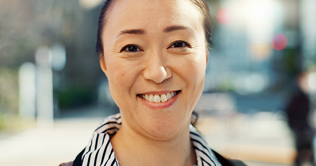 Image showing Mature, Asian woman in city and face with travel or commute to work and professional in Tokyo. Corporate lawyer in urban street, journey to office and happiness in portrait with business mindset