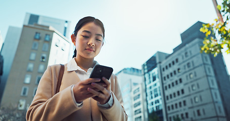 Image showing Happy woman, phone and walking in city for communication, social media or outdoor networking. Young female person smile on mobile smartphone for online chatting, texting or research in an urban town