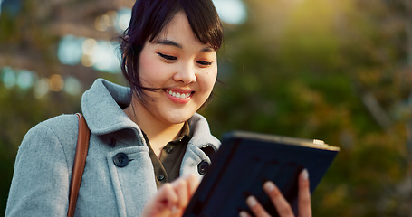 Image showing Asian woman, tablet and city for social media, research or communication in outdoor networking. Face of happy female person smile on technology for online search, chatting or texting in an urban town