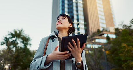 Image showing Happy asian woman, tablet and city for social media, research or communication in outdoor networking. Business female person smile on technology in online search, chatting or texting in an urban town