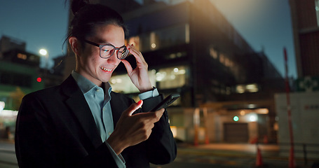 Image showing Phone, night and Asian businessman in the city networking on social media, mobile app or internet. Technology, smile and young professional male person with cellphone for research in town at night.