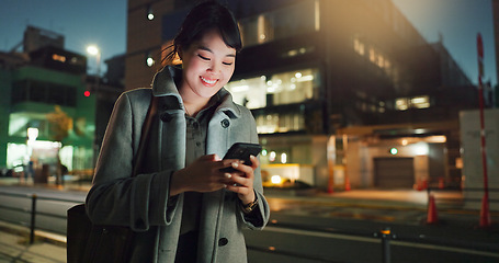 Image showing Asian woman, phone call and laughing at night in city for funny joke, conversation or outdoor travel. Happy female person smile and talking on mobile smartphone in late evening for discussion in town