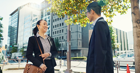 Image showing Business people, smile and greeting with meeting, bow and conversation and communication. Outdoor, Japanese group and coworkers with urban town, buildings and staff with travel, commute and smile