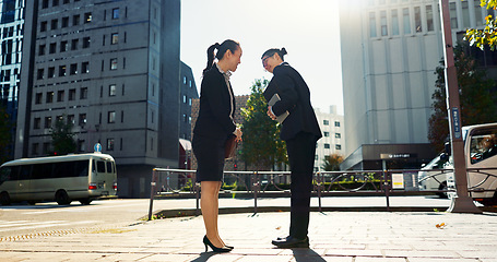 Image showing Asian, people in city and professional with bow for greeting, conversation with travel and commute to work. Business man, woman and hello in Tokyo, journey and urban street, communication and respect