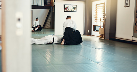 Image showing Students, karate or man teaching martial arts in dojo for fitness, discipline or self defense for combat Demonstration, workout or kung fu master training a person for fighting, education or class