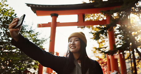 Image showing Selfie, nature and Japanese woman with peace sign for holiday, vacation and adventure in Japan. Happy, travel and person take picture on smartphone for social media post, memories and online blog