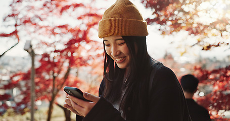 Image showing Selfie, travel and Japanese woman in forest for holiday, vacation and adventure in Japan. Happy, smile and person take picture on smartphone in nature for social media post, memories and online blog