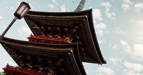 Image showing Building, architecture and Japanese temple, culture and outdoor for travel, low angle and worship. Landscape, tourism and Fushimi Inari Taisha Shrine in Kyoto, traditional landmark and pagoda