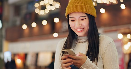 Image showing Phone, search and Japanese woman in city for travel, chat or map navigation outdoor. Smartphone, smile or happy lady person in Japan with app for location, guide or taxi, service or chauffeur request