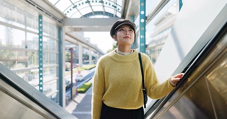 Image showing Woman, escalator and Japanese holiday or journey destination booking, airport or travel. Female person, Tokyo and passenger or boarding international flight or adventure explore, vacation or tour