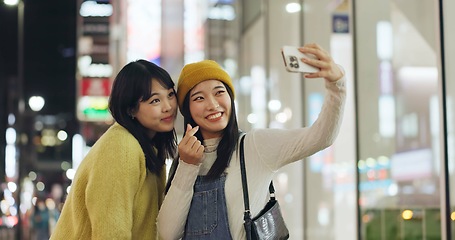 Image showing Friends, Japanese and selfie with women, smile and excited with blog post, memory and social media. People, smartphone or girls in a street, night and picture with pose, cheerful and bonding together