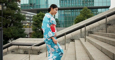 Image showing Stairs, woman and walking with traditional clothes, travel and fresh air with wellness, healthy and peace. Japanese person, city and girl with culture, movement and thinking with student and steps