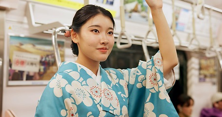 Image showing Woman, japan and train, kimono and travel with public transport, metro bullet in city. Person, journey or traditional clothes in motion blur on weekend or commute in tokyo and passenger on adventure