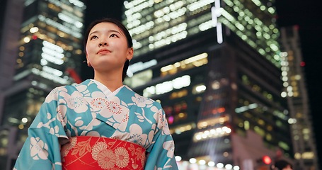 Image showing Thinking, night and Japanese woman with ideas, decision, choice and opportunity with adventure, wonder and travel. Person, outdoor and girl in the streets, evening and commute with peace and thoughts