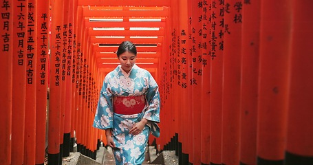 Image showing Woman, Japanese and walking at temple in traditional kimono or Tokyo for worship, respect or faith. Female person, shinto building and stairs for heritage peace or outdoor journey, travel or history