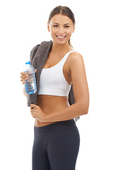 Image showing Happy, portrait and woman with water for gym and wellness in white background of studio. Person, smile and start of sports, workout and exercise with liquid in bottle for hydration or health benefits