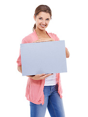 Image showing Portrait, woman and mockup of poster, presentation and advertising board, broadcast deal and commercial in studio on white background. Happy model, paper sign or feedback to launch promotion about us