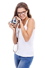 Image showing Photographer, happy woman and retro camera in studio for creative photoshoot, art blog and media production on white background. Portrait, journalist and photography for content creation of magazine