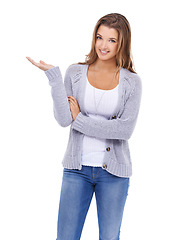 Image showing Smile, portrait and woman with hand pointing in studio for announcement, news or checklist on white background. Information, face and female model show promotion, feedback or review, deal or platform