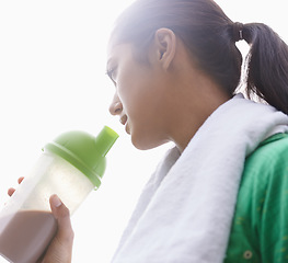 Image showing Sports, drink and woman with protein shake in bottle for health, wellness and energy benefits after exercise. Outdoor, fitness or person with smoothie in container for nutrition in diet after workout