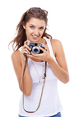 Image showing Photographer, woman and portrait with retro camera in studio for photoshoot, content creation and paparazzi magazine on white background. Happy journalist, photography or lens for creative production