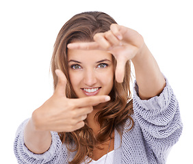 Image showing Woman, portrait and finger frame in studio to review profile picture, composition or creativity on white background. Happy model, hands and planning perspective of face, photography or perfect selfie