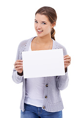 Image showing Portrait, woman or presentation of mockup, poster or advertising sign, broadcast deal or commercial in studio on white background. Happy model, paper board or feedback to launch promotion coming soon