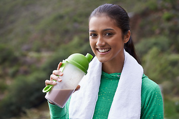 Image showing Sports, drink and portrait of woman with protein shake in bottle for health, wellness and energy benefits for exercise. Outdoor, hiking or person with smoothie for nutrition in diet after workout
