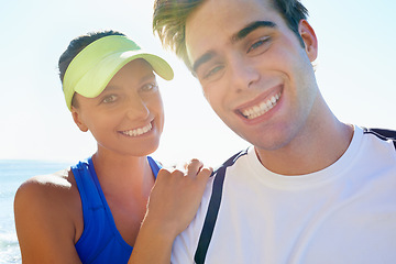 Image showing Couple, outdoor and portrait in beach front, exercise and fitness with smile, training and sunrise for run. Man, woman and athletic for ocean, sea and ready together in summer, happy and workout