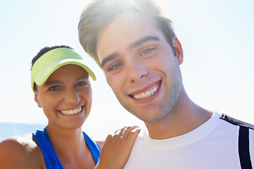 Image showing Couple, outdoor and portrait in beach, exercise and fitness with smile, training and sunrise for run. Man, woman and athletic for ocean, sea and workout together in summer, happy and touching