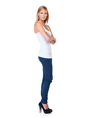 Image showing Arms crossed, fashion or portrait of woman in studio isolated on white background with elegance or heels. Full body, cool female person or girl model with confidence, modern style or trendy clothes