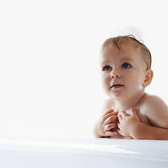 Image showing Face of baby in bath, clean skin with mockup in morning routine for health, wellness and body care in home. Cute toddler washing in water with hygiene, relax and calm child sitting in tub in bathroom