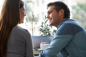 Image showing Love, coffee shop and relax couple happy for romantic date, care and eye contact in diner, cafe or restaurant. Relationship, hospitality service and cafeteria man flirting with girlfriend over drinks