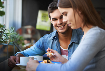 Image showing Food, happy and couple eating in cafe, care and bonding together on valentines day date in the morning. Smile, man and woman in restaurant with breakfast coffee drink, love and relationship in shop