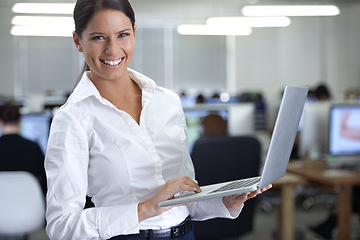 Image showing Business woman, portrait and laptop in workspace for information technology, planning and software management. Professional leader or manager on computer for workflow and employees schedule in office