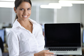 Image showing Business woman, computer screen and office presentation for website, information technology and registration. Portrait or face of professional worker on laptop space or mockup for online programming