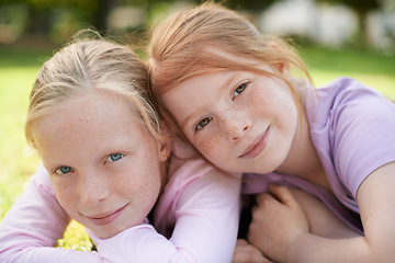 Image showing Portrait, happy kids or sisters relax in park for bond, holiday and play together with support or hug. Nature, children or girl siblings on outdoor grass with care, love or friendship in a garden