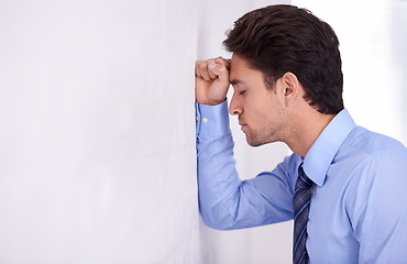 Image showing Depression, business man and head on wall for financial crisis, burnout and anxiety for challenge fail. Stress, frustrated and a tired professional in bankruptcy, debt and mistake in office mockup