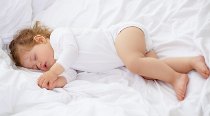 Image showing Baby, kid and sleeping on bed for calm break, peace and dream to relax at home from above. Tired, cozy or young child asleep for newborn development, healthy childhood growth and rest in nursery room