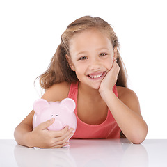 Image showing Piggy bank, save money and girl kid in portrait, finance and learning cash management on white background. Budget, growth and investment, young person and financial security for future in studio