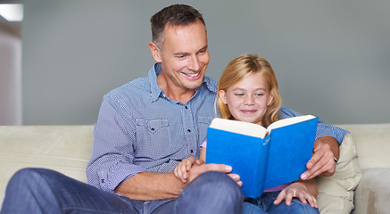 Image showing Father, child and reading book for education at home, story and fantasy fiction for learning. Daddy, daughter and bonding together in childhood, literacy and storytelling for language development
