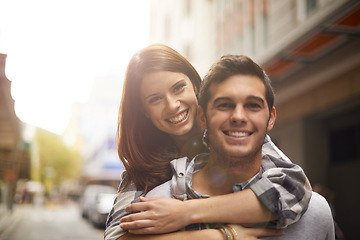 Image showing Love, portrait and happy couple hug, piggyback and together for outdoor date, bonding and fun in new city. Wellness, happiness and face of gen z man, woman or people smile for relationship commitment