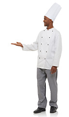 Image showing Happy, chef and hand gesture in studio with friendly service and professional cook in hospitality job. Black man, positive and open palm small business in pride and uniform by hat by white background