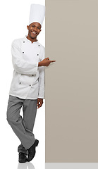 Image showing Billboard, portrait and black man chef with hand pointing to studio for checklist, menu or space on white background. Bakery, presentation or baker face with food tips poster, guide or steps mock up