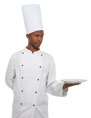Image showing Man, chef and empty plate presentation in studio isolated on a white background mockup space. African waiter, cooking and show dish in catering service, professional advertising menu and gastronomy